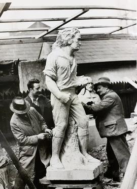 Albert Power at work with assistants