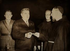 Presentation by Fr. Gerald McCann to Captain Robert Monteith